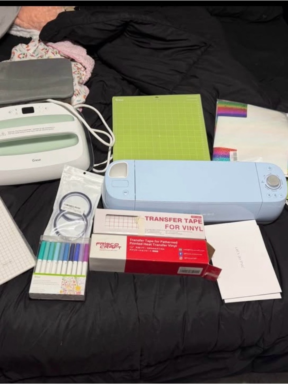 Cricut Light Blue Cutting Machine with Green Mat and Rainbow Vinyl